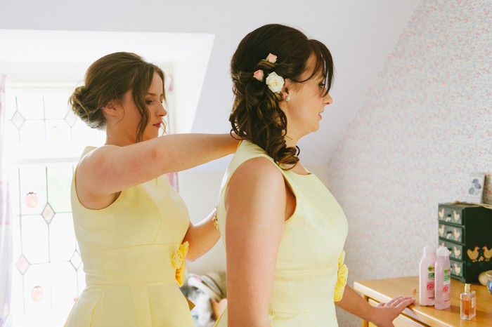 bridesmaids getting dressed